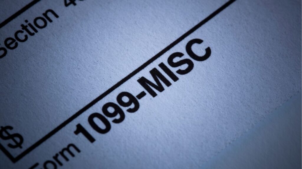Close-up of 1099-MISC tax form, representing worker classification differences between W-2 employees and 1099 contractors for staffing firms.