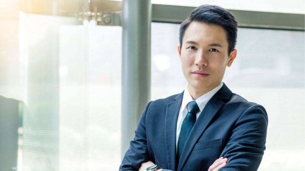 Confident sales professional representing transition from salesperson to entrepreneur in staffing.