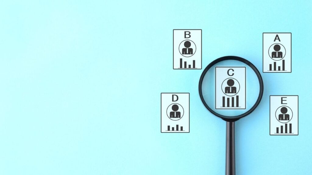 Recruiter evaluating candidates and selecting top talent with a proven track record.