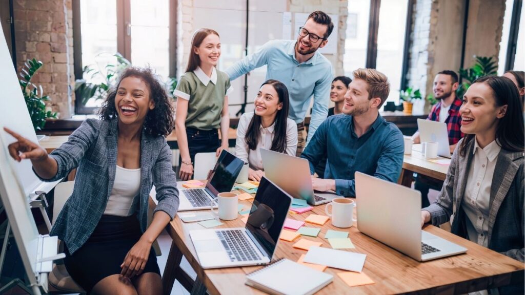 Team collaborating on strategy and communication, representing a professional and relationship-focused approach to collections for staffing firms.