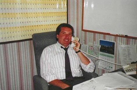 Lenny Tierney, founder of Madison Resources, working in his office during the early years of building the staffing payroll funding and back-office services company.