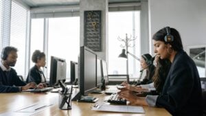 staffing operational efficiency team - Madison Resources - Madison Resources Staffing professionals working together in an office to improve staffing operational efficiency through recruiting, communication, and back-office collaboration.