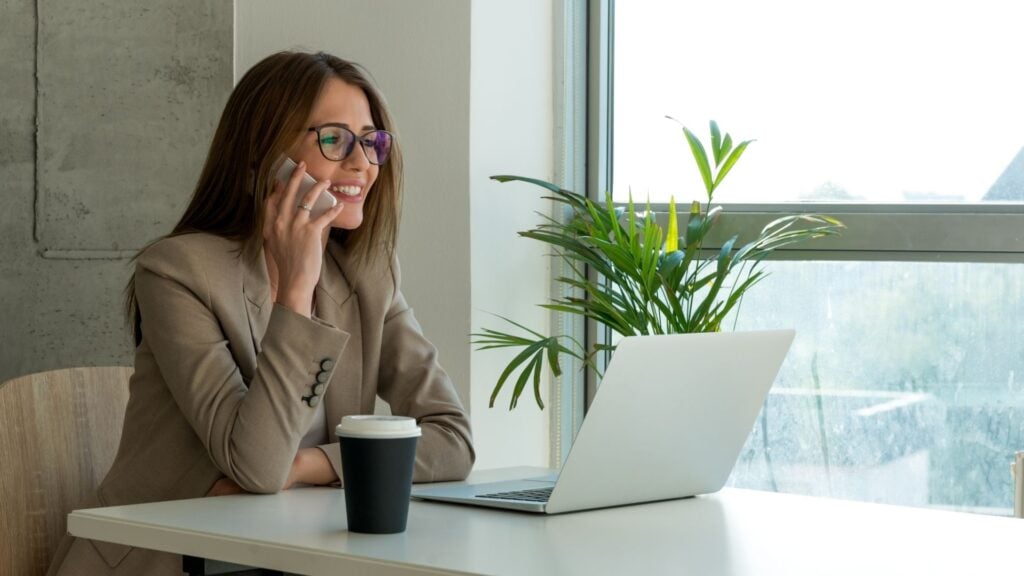 Staffing agency collections call to follow up on an unpaid client invoice.